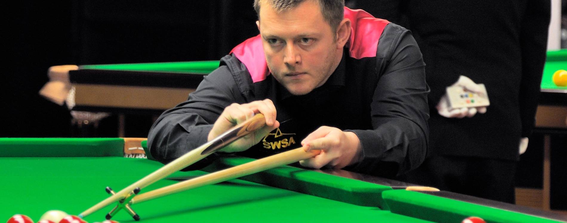 2021 & 2022 Northern Ireland Open winner Mark Allen plays a shot
