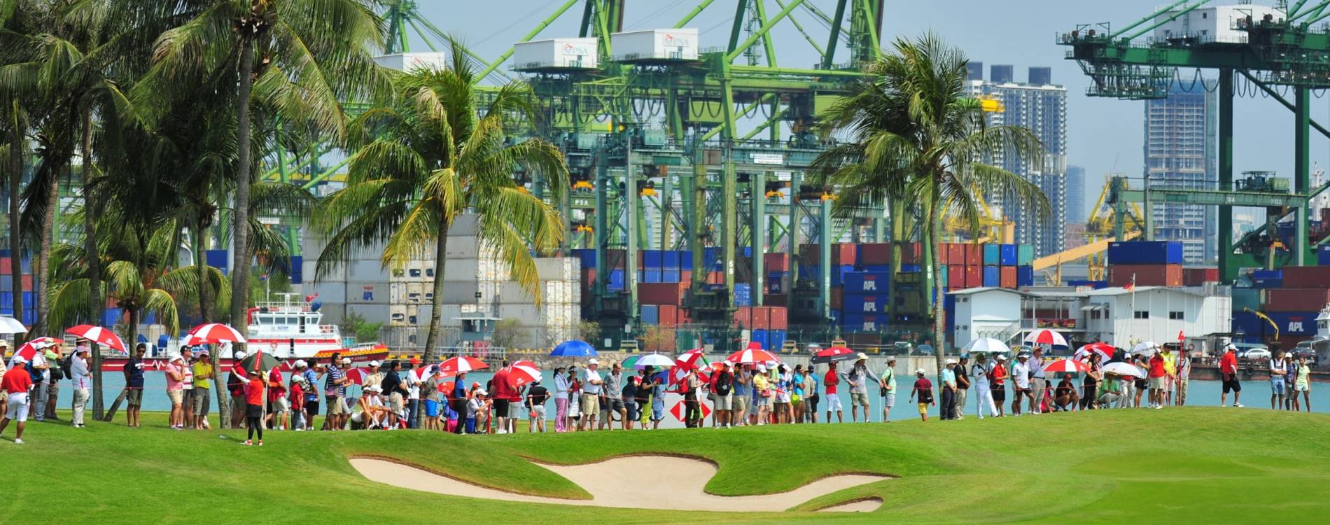 A crowd gather at Sentosa Golf Club