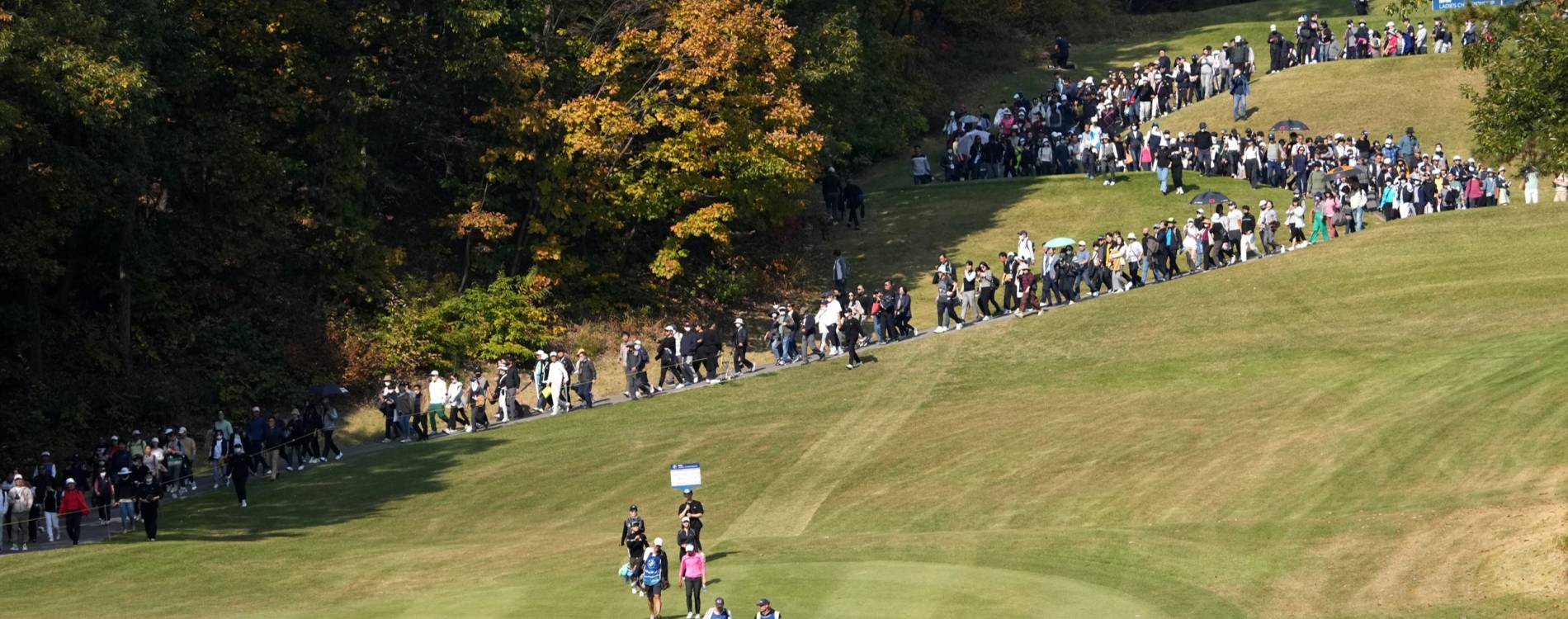 A crowd gathers to watch the BMW Ladies Championship