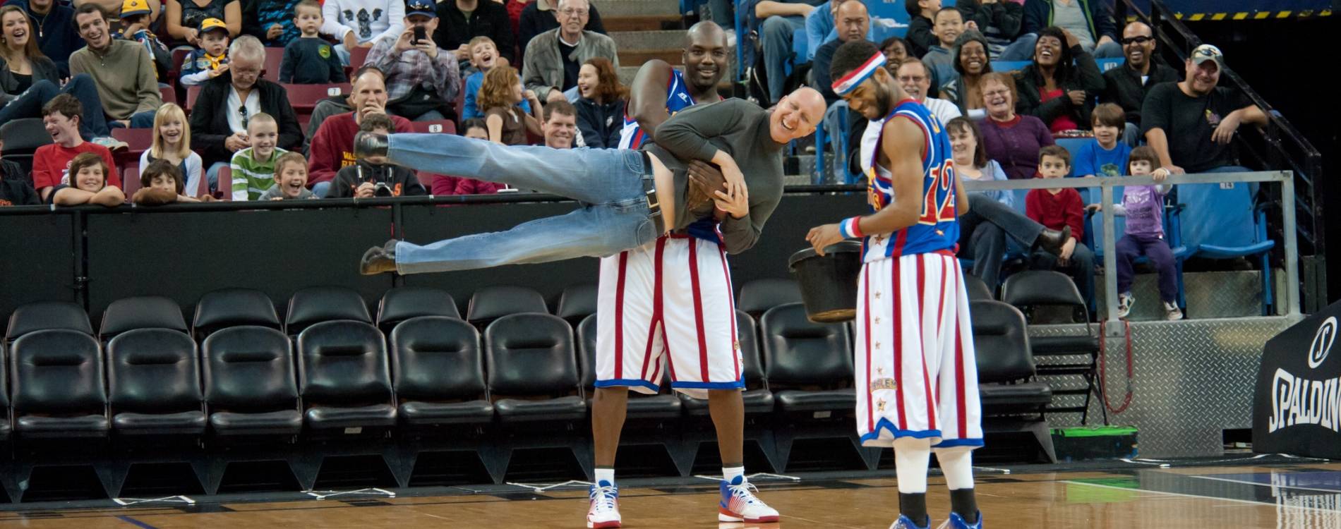 A fan gets involved at a Harlem Globetrotters game