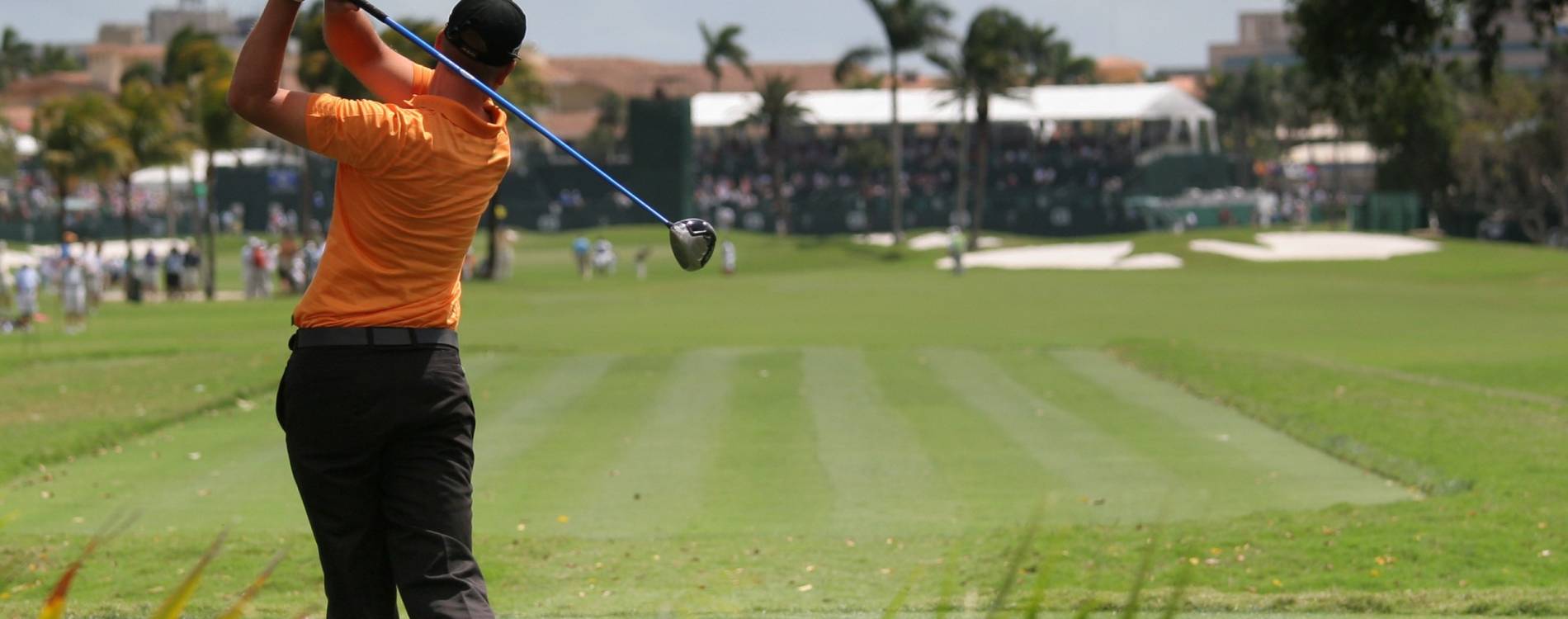 A PGA Tour player tees off at a golf event