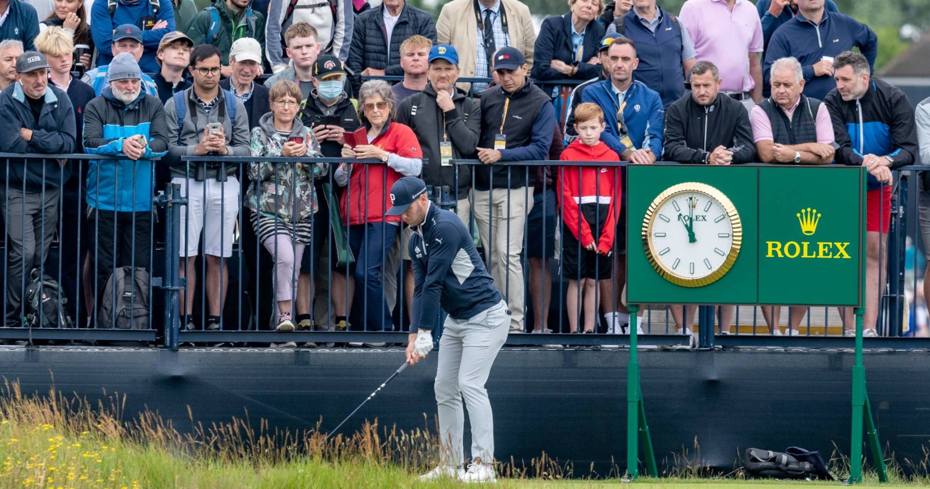 A player tees off at The Open