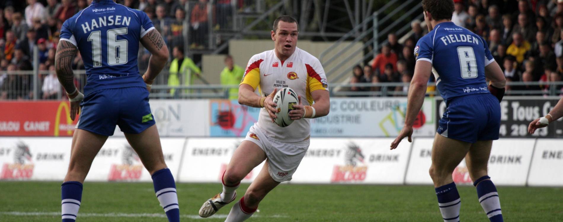 A Super League rugby match between Catalans Dragons and Wigan Warriors