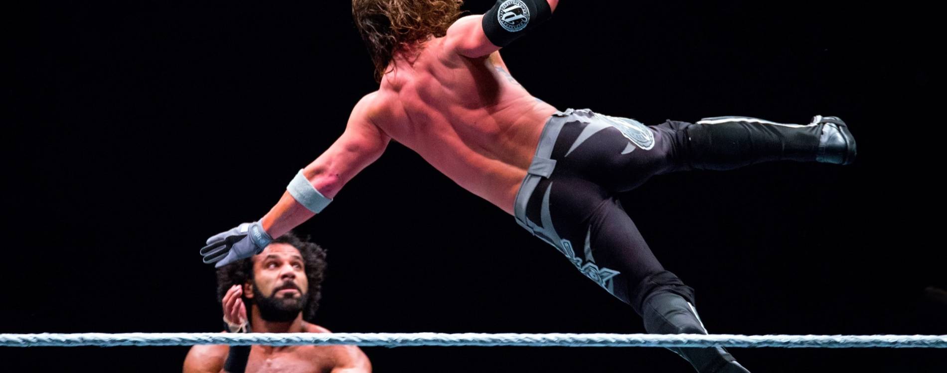 AJ Styles flies through the air