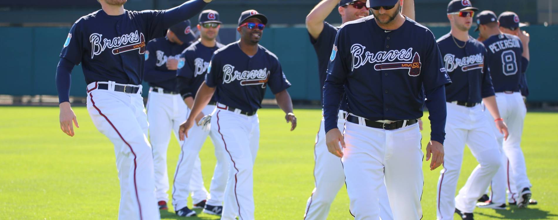 Atlanta Braves players warm up during Spring Training