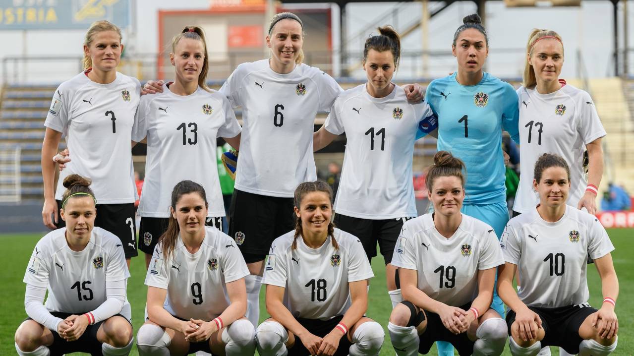 Austria pose for a team photo before a match with Serbia