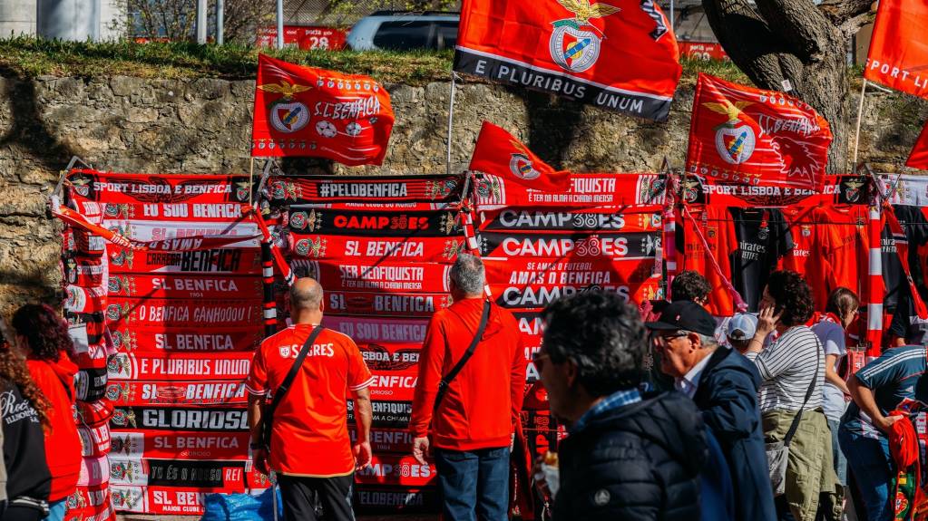 Benfica fans check out merchandise outside the stadium