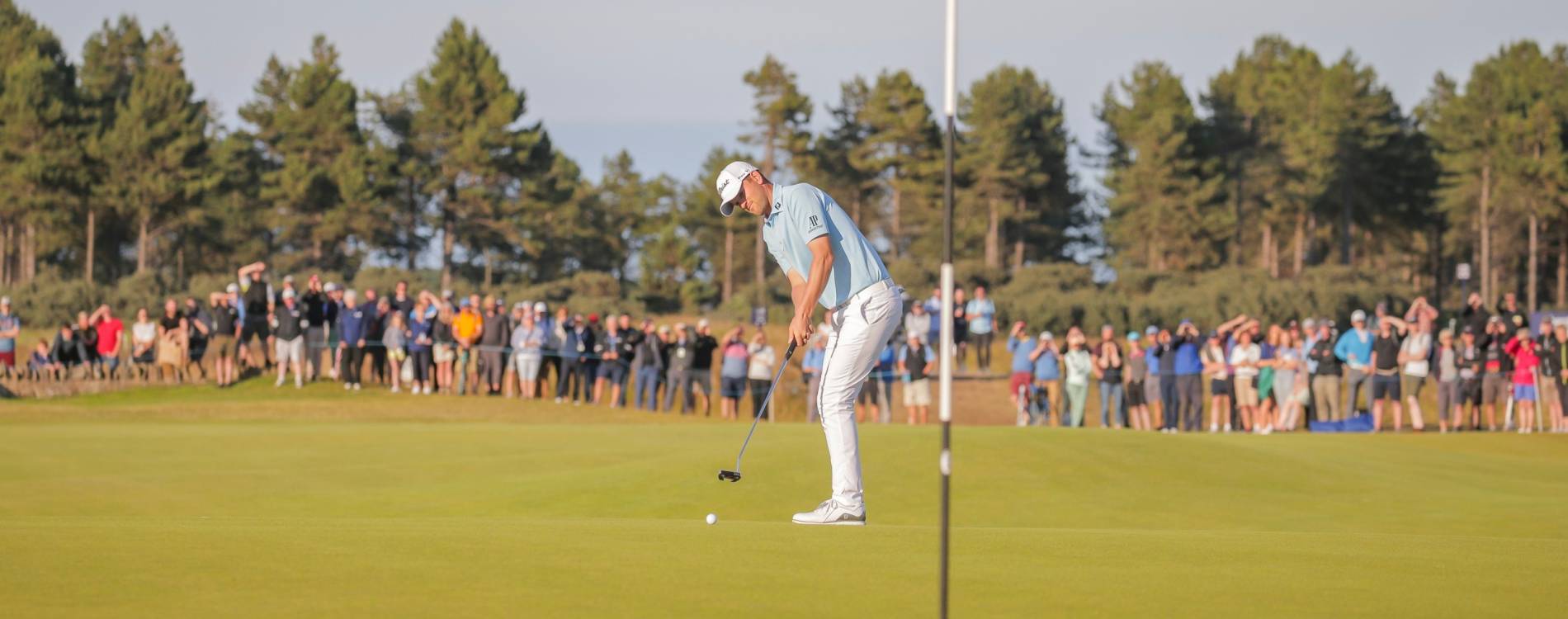 Bernd Wiesberger making a putt on the 18th green at the Scottish Open