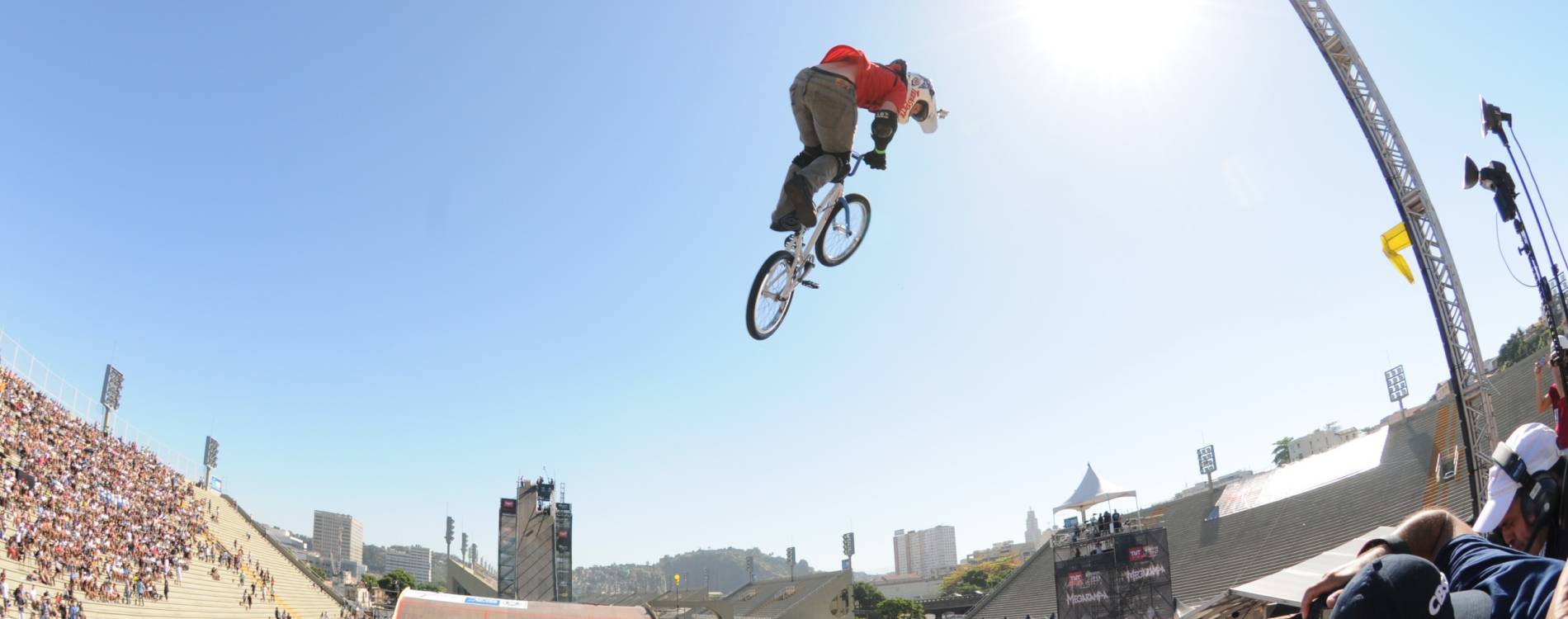 BMX Freestyle competitor performs tricks