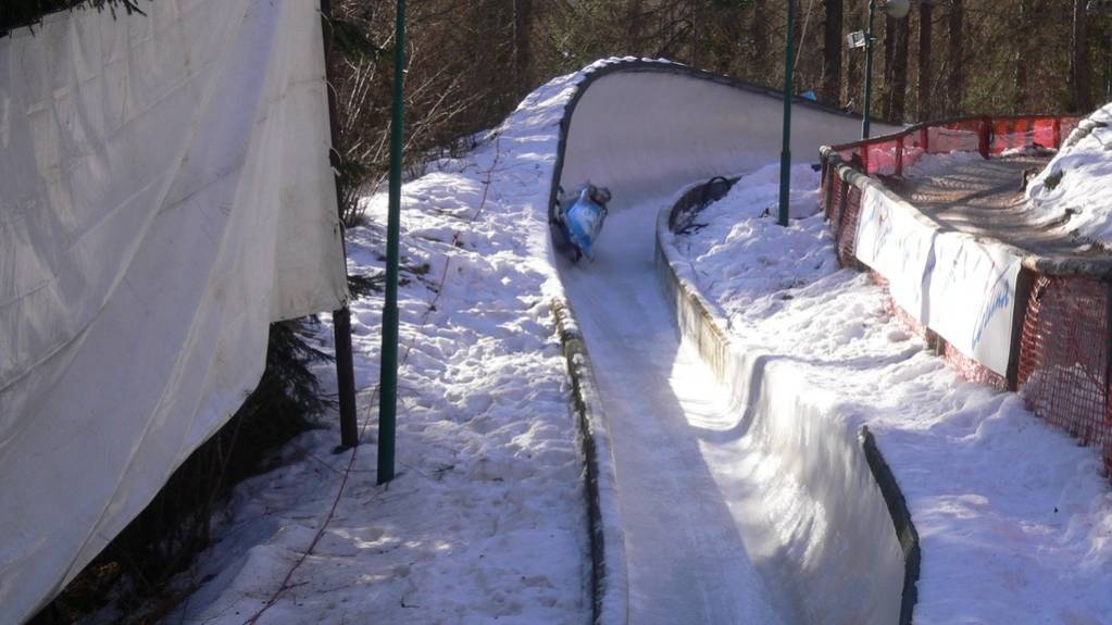 Bobsleigh on the track at Pista Eugenio Monti