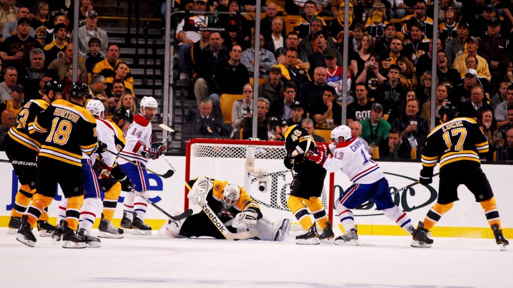 Boston Bruins goalie makes a full body save