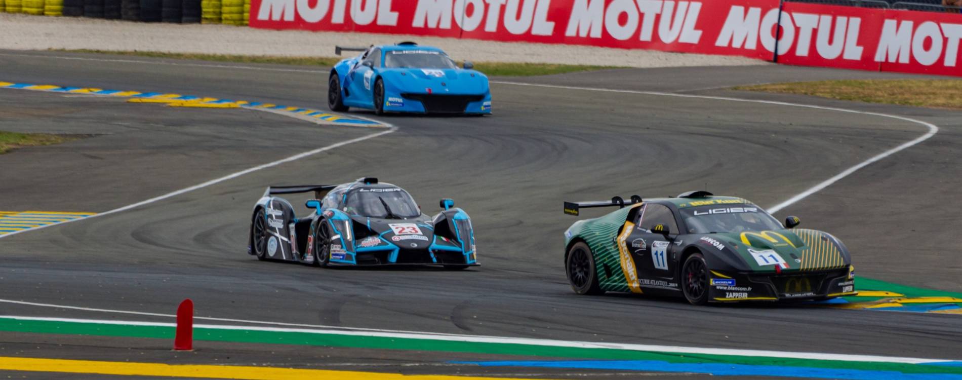 Cars compete in 24 Hours of Le Mans