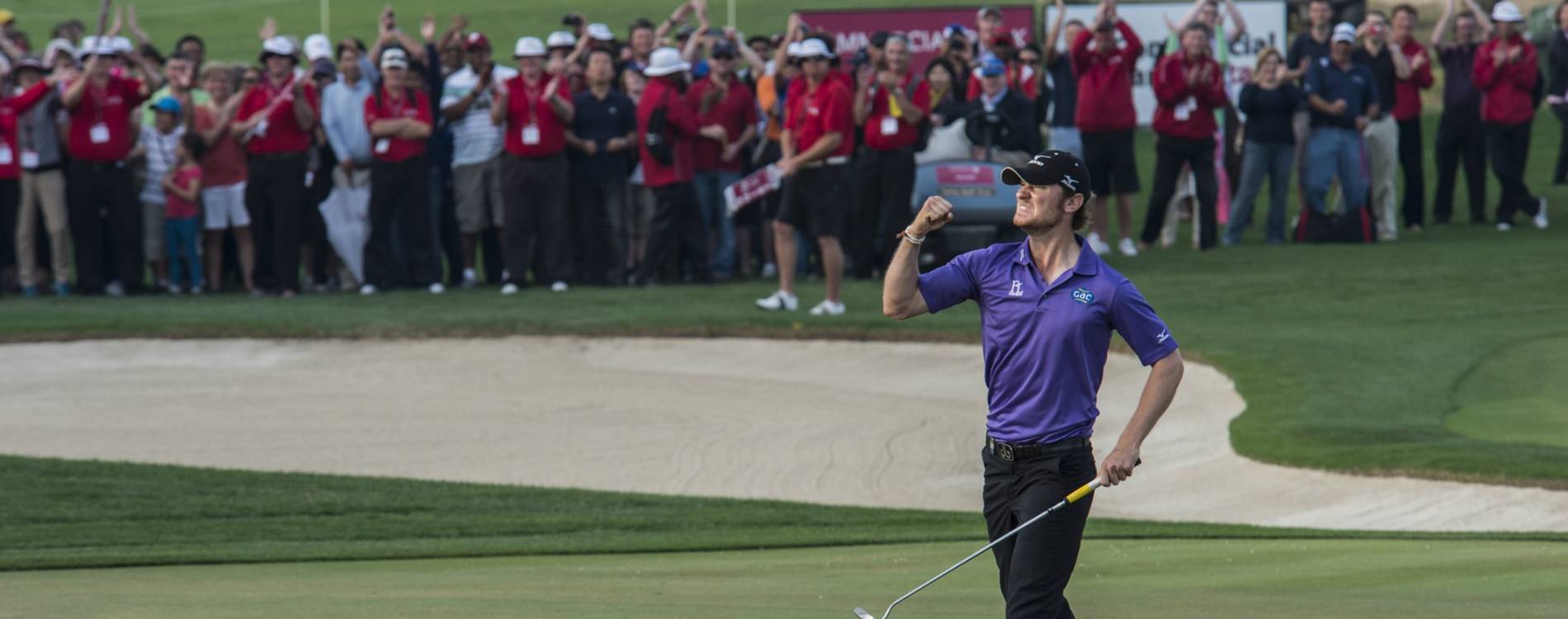 Chris Wood celebrates at the Qatar Masters