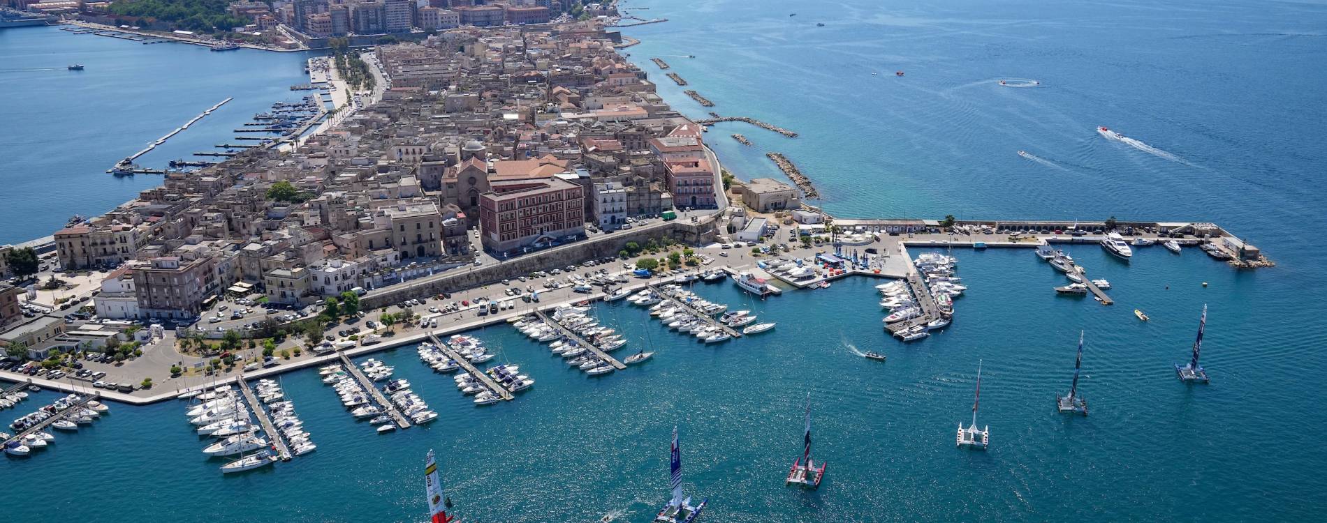 Crews wait to race in the Taranto Sail Grand Prix