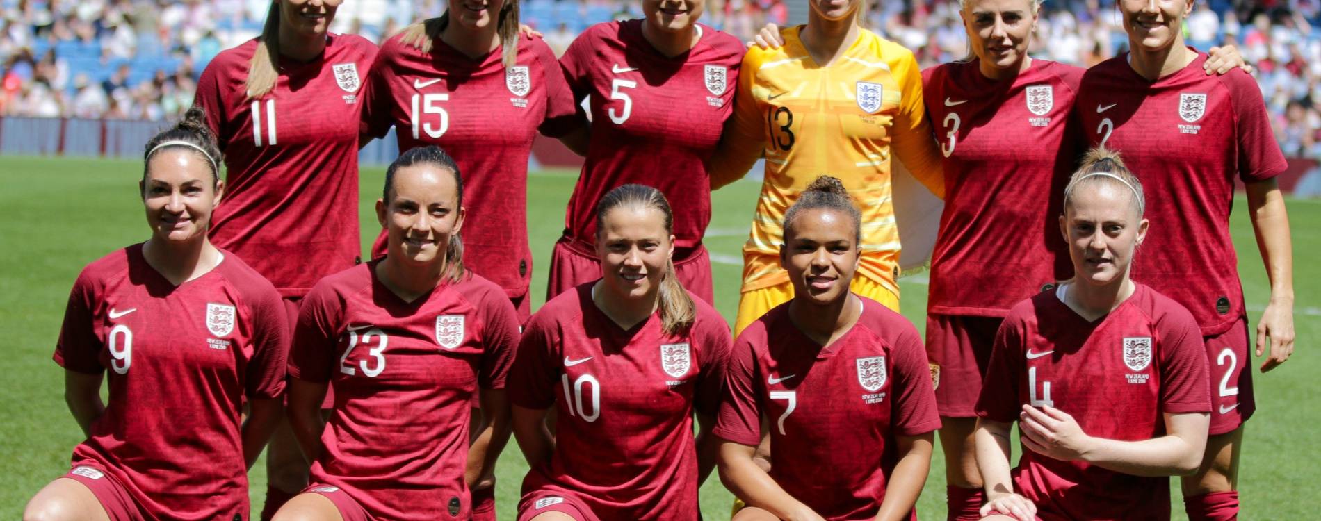 England women's team pose for a photo before a game