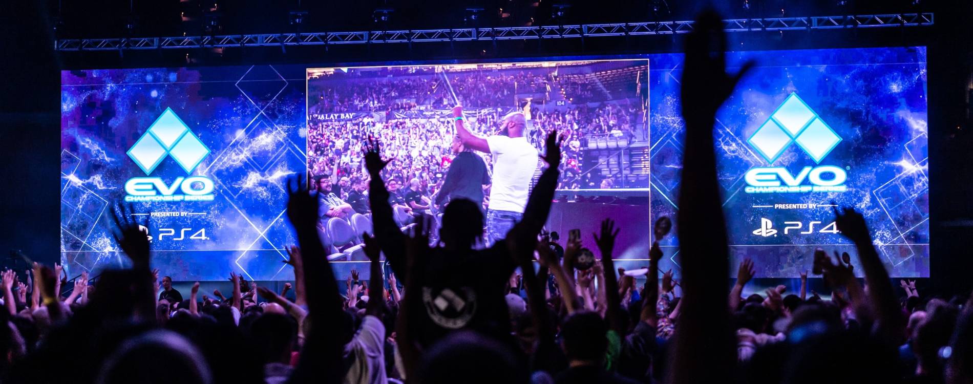 Fans celebrate during an event at EVO