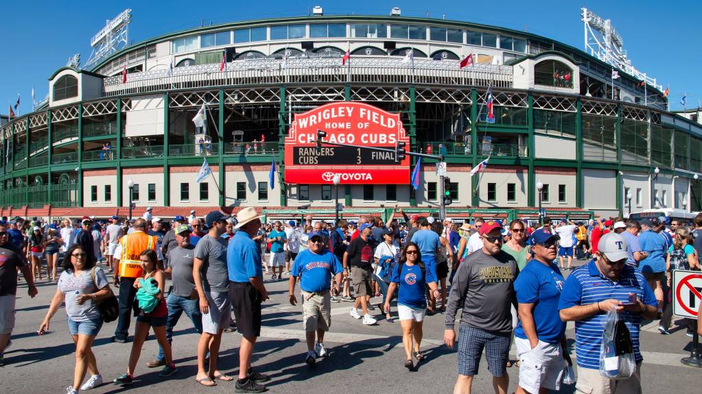Fans gather outside Wrigley Field in Chicago