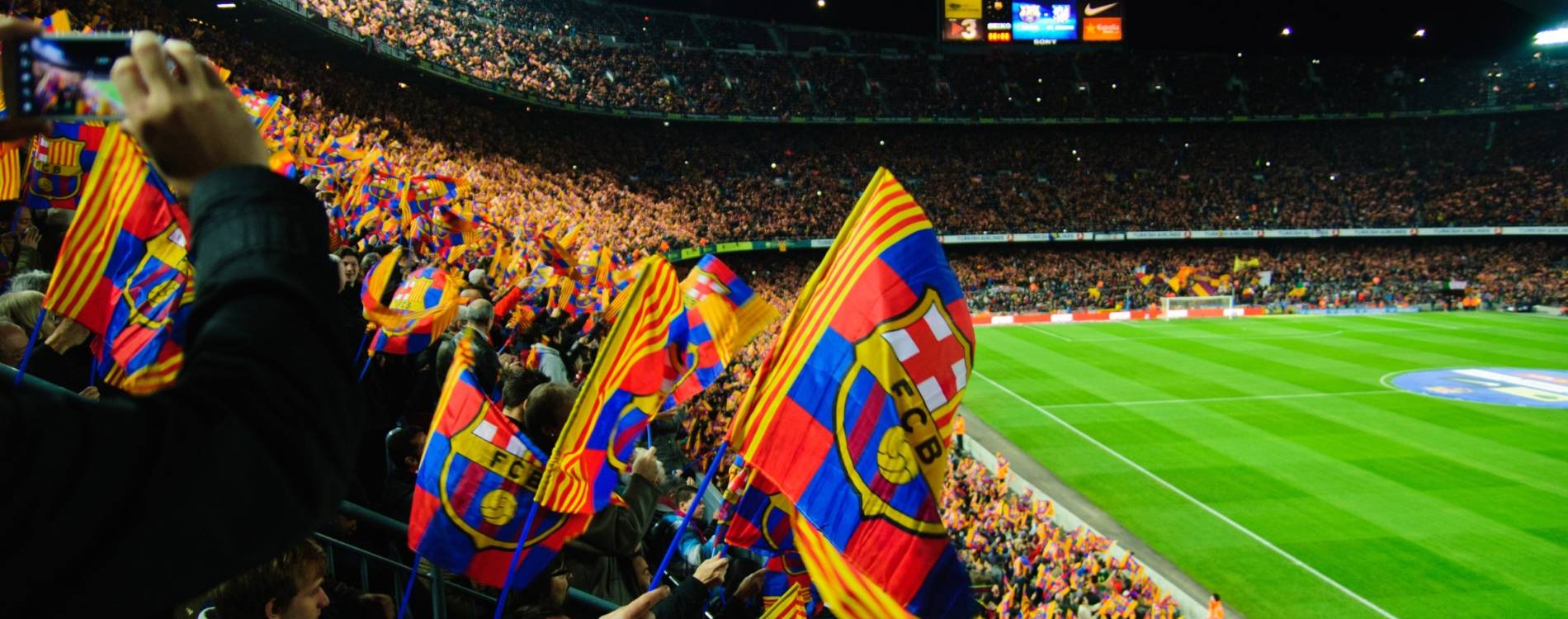 FC Barcelona Fans Wave Flags