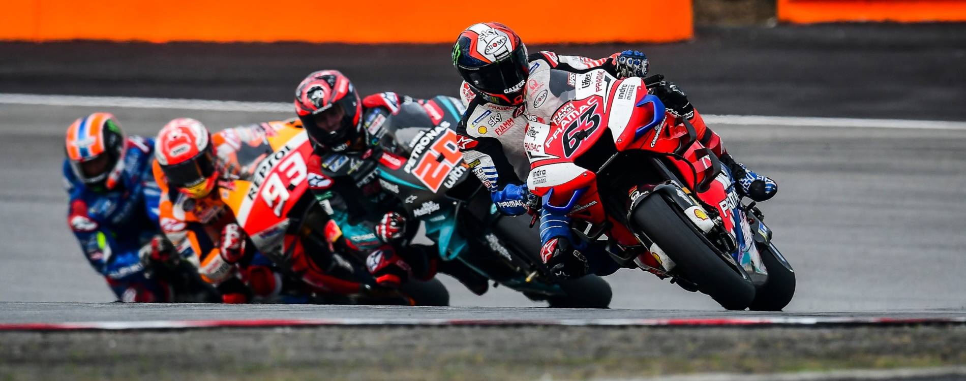 Francesco Bagnaia leading the pack during a MotoGP race