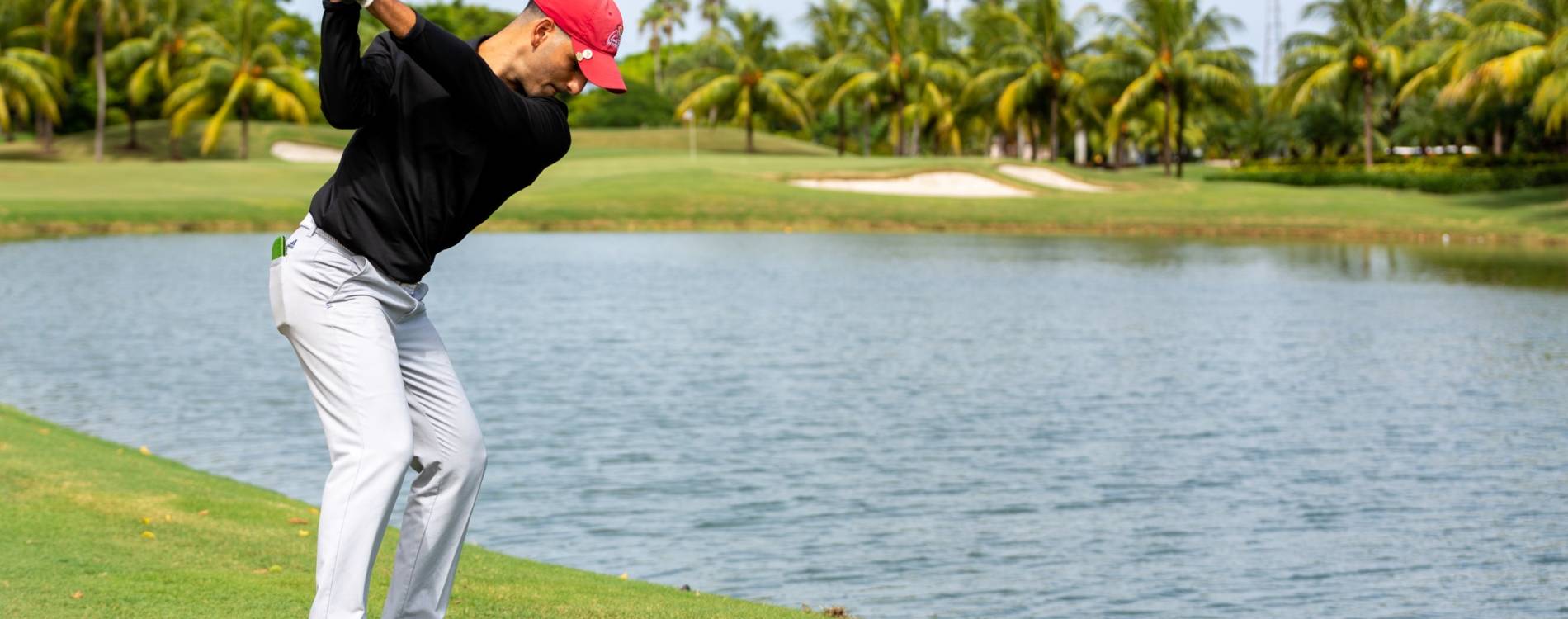 Golfer tees off at Golf Club in Miami