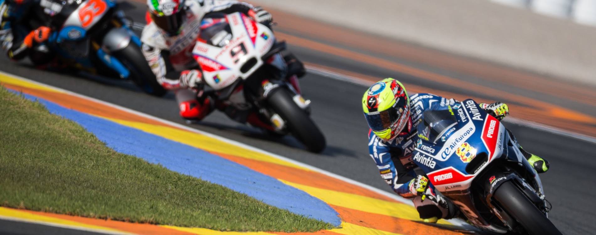 Hector Barbera leads MotoGP riders around a corner at Circuit Ricardo Tormo
