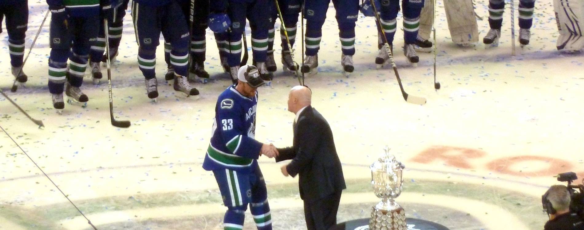 Henrik Sedin with the Clarence S. Campbell Bowl