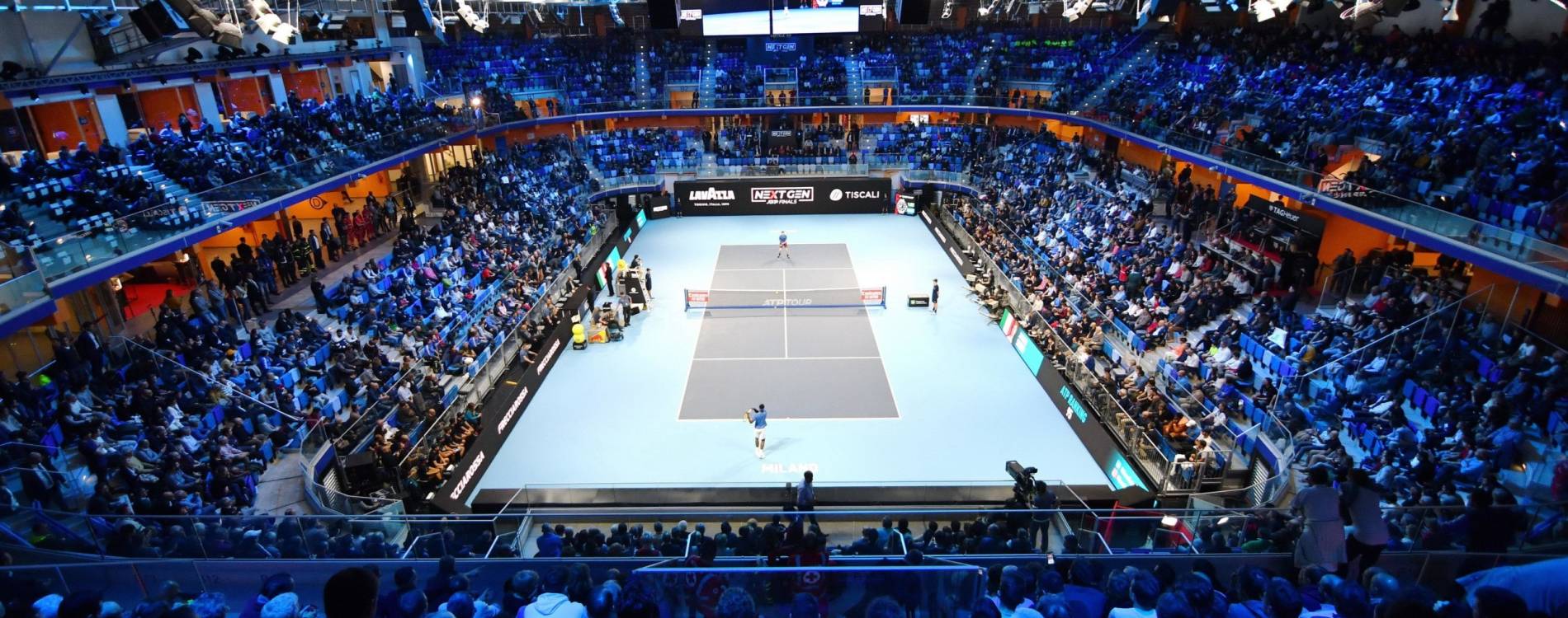 Jannik Sinner and Frances Tiafoe competing at the Next Gen ATP Finals
