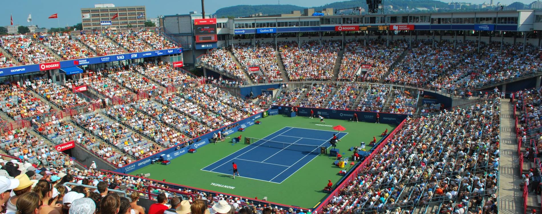 Jo-Wilfried Tsonga and Andy Murray in action at the men's National Bank Open
