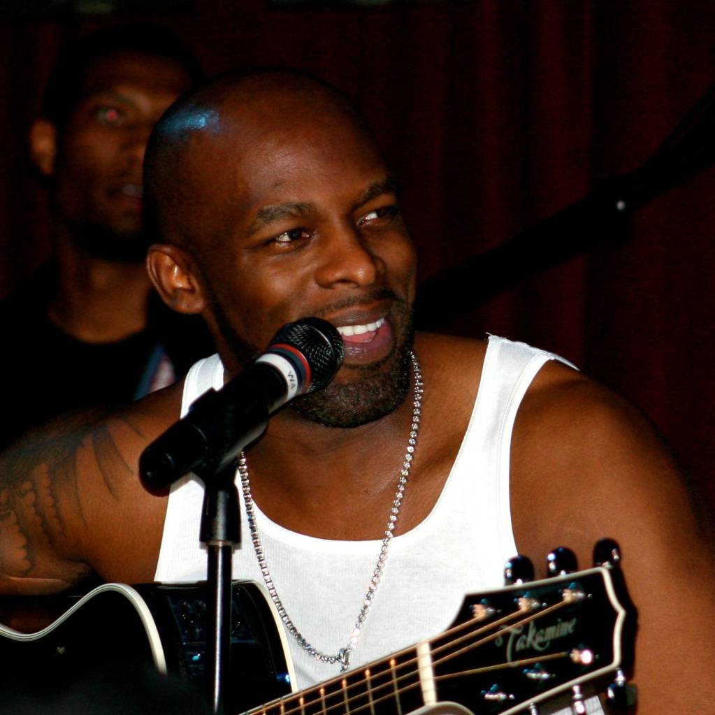 Joe playing guitar during his show at B.B. Kings in NY