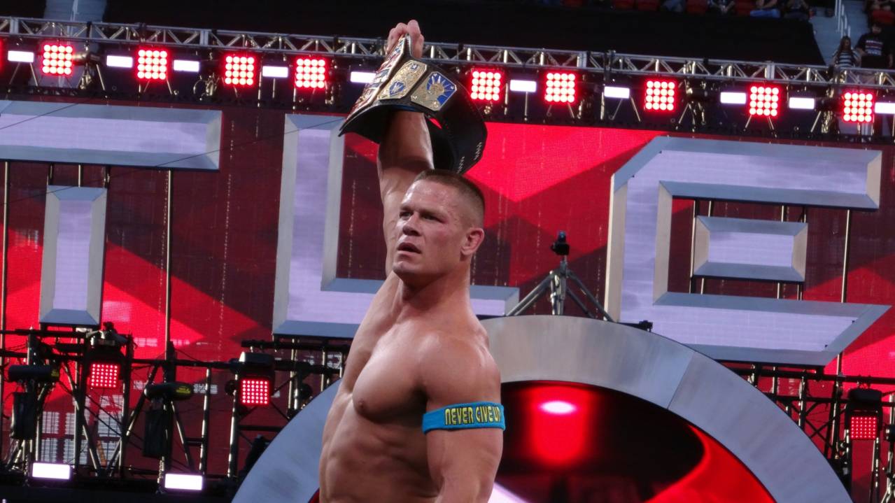 John Cena raises a title at WrestleMania