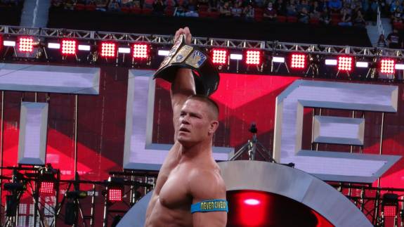 John Cena raises a title belt
