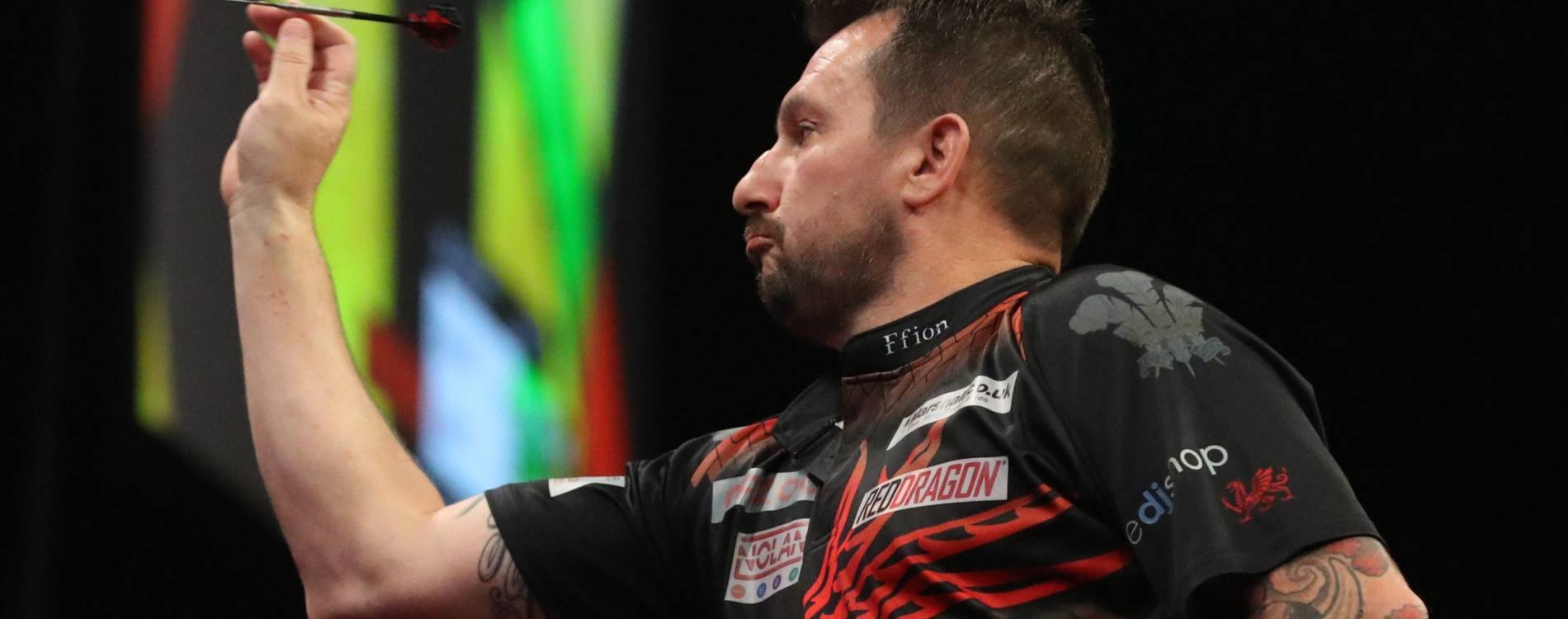 Jonny Clayton competing at a Premier League Darts event