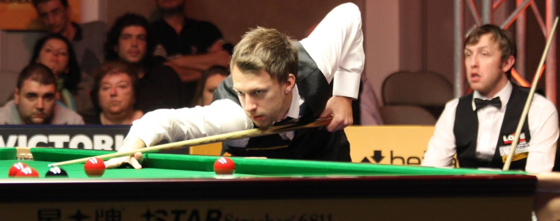 Judd Trump in action at a snooker event