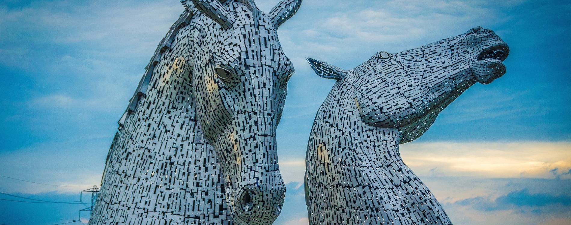 Kelpies against a blue sky