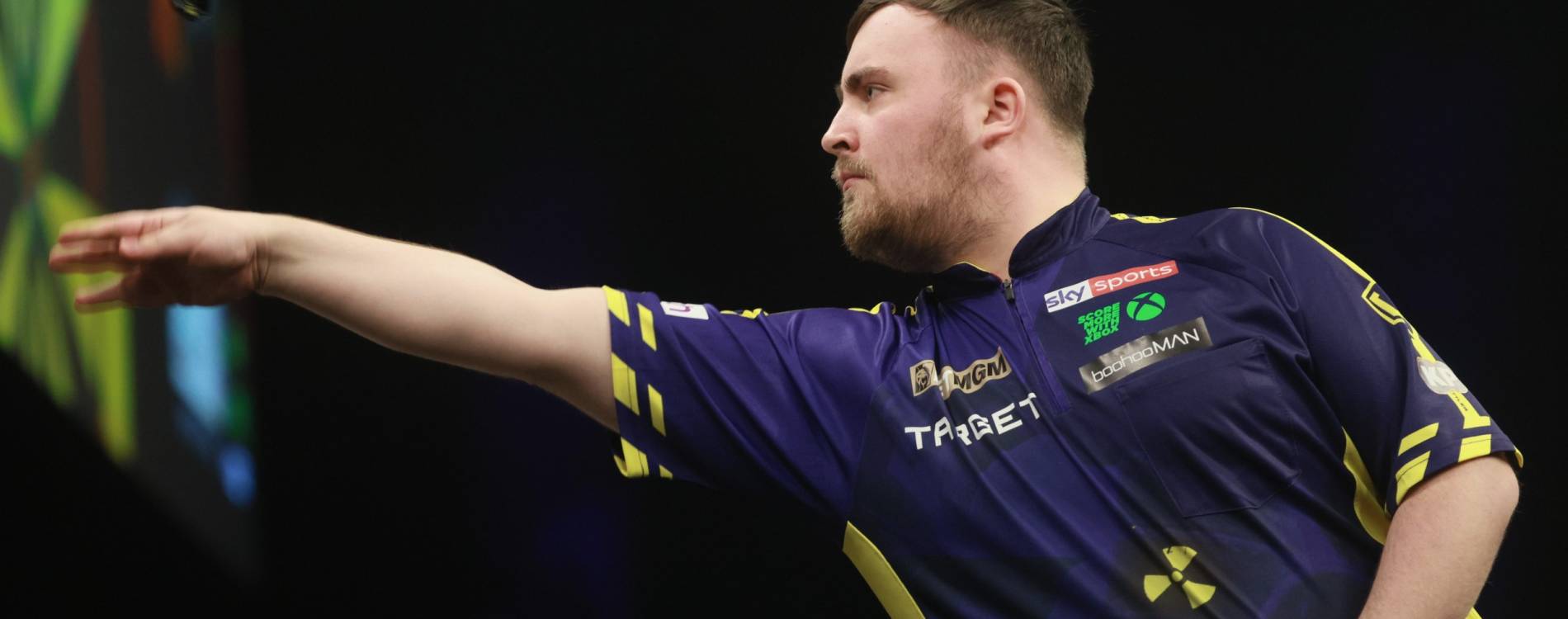 Luke Littler competing at the BetMGM Premier League Darts in the Uber Arena Berlin