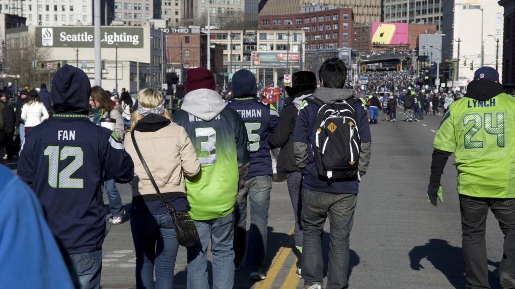 Many NFL fans choose to wear team jerseys to games