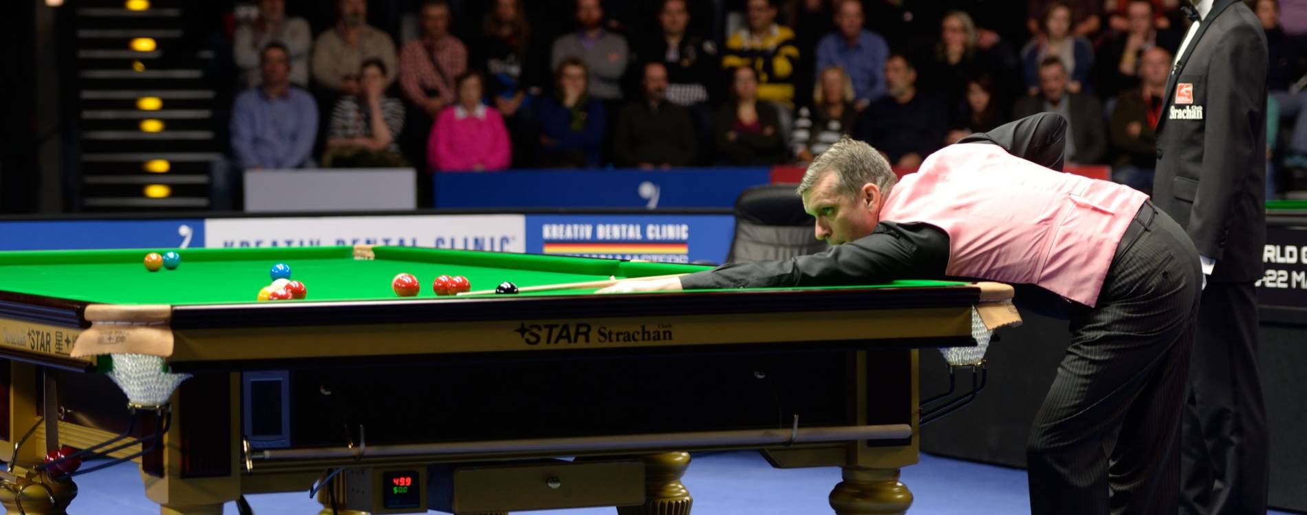 Mark Davis plays a shot during a World Snooker Tour event