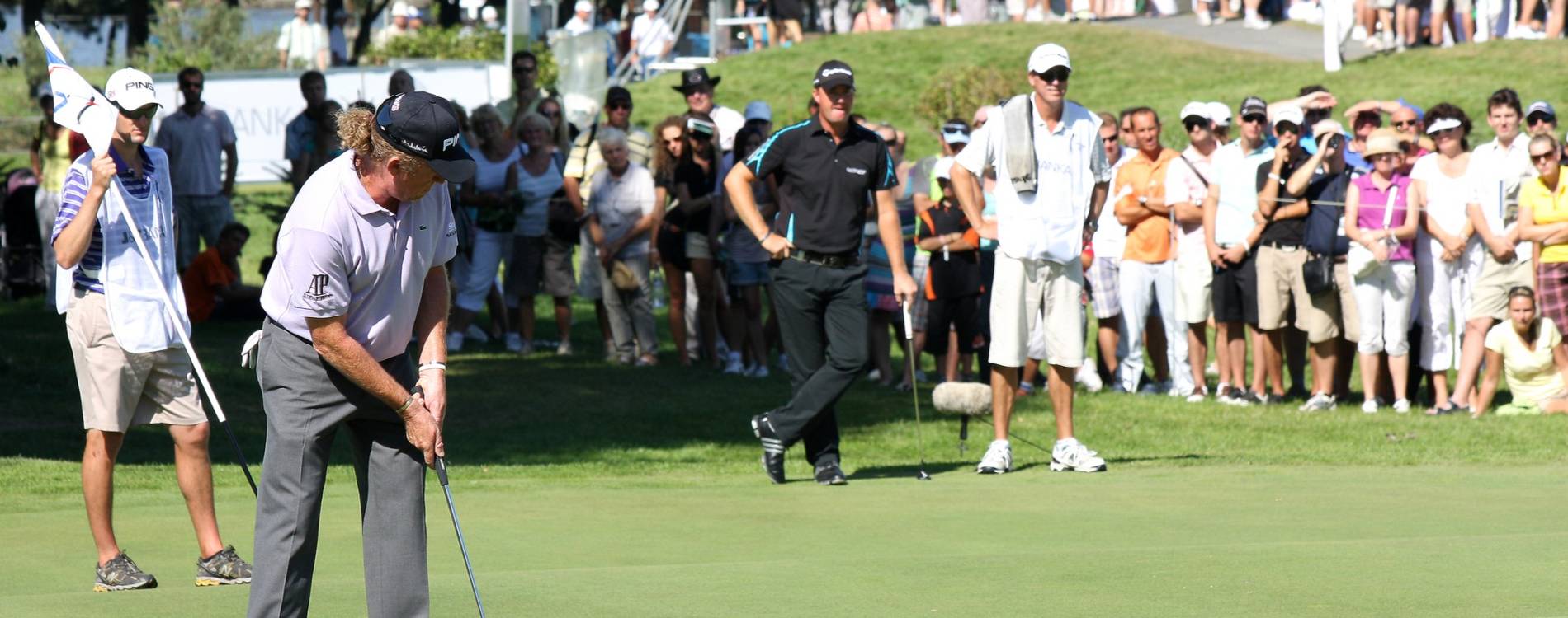 Miguel Angel Jimenez makes a putt