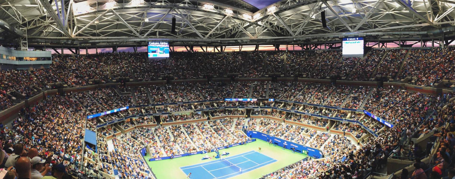 Naomi Osaka and Coco Gauff competing in Arthur Ashe Stadium during the US Open