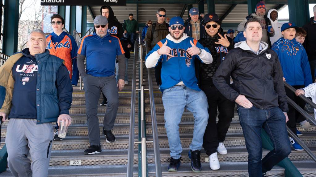 New York Mets fans head to a game at Citi Field