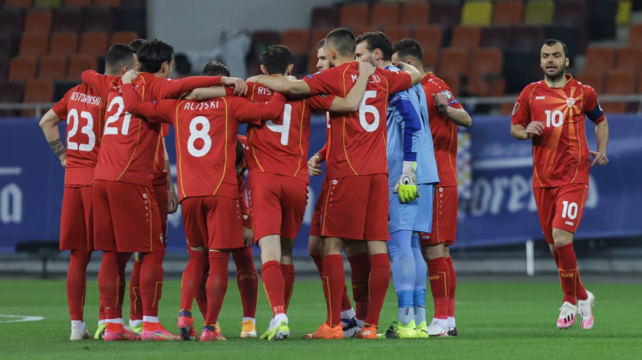 North Macedonia huddle before a World Cup qualifier with Romania