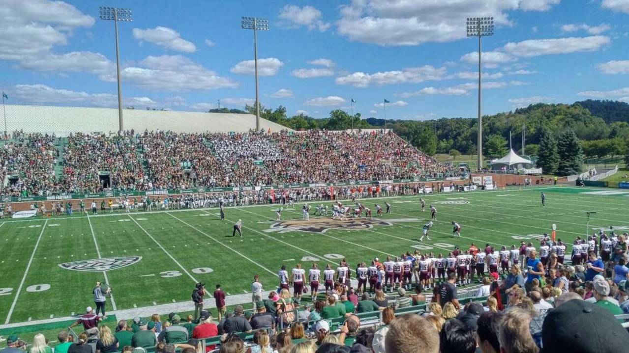 Phillips Club seating is the closest to the field, visible here with green back supports