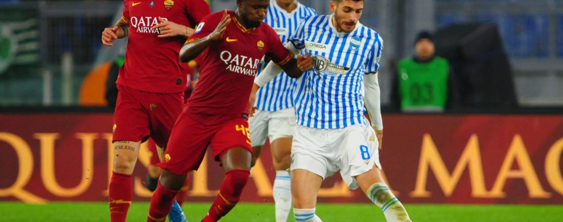 Players contest the ball in Serie A