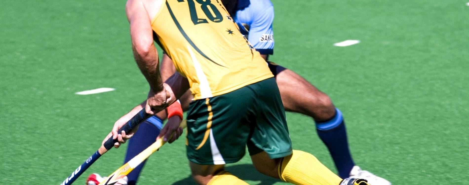 Players duel for a hockey ball