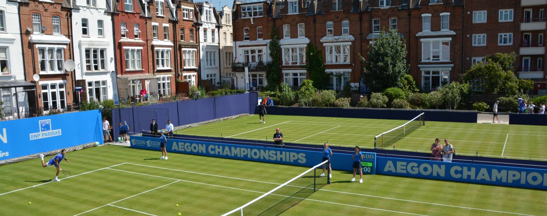 Players warm up on the courts at The Queen's Club