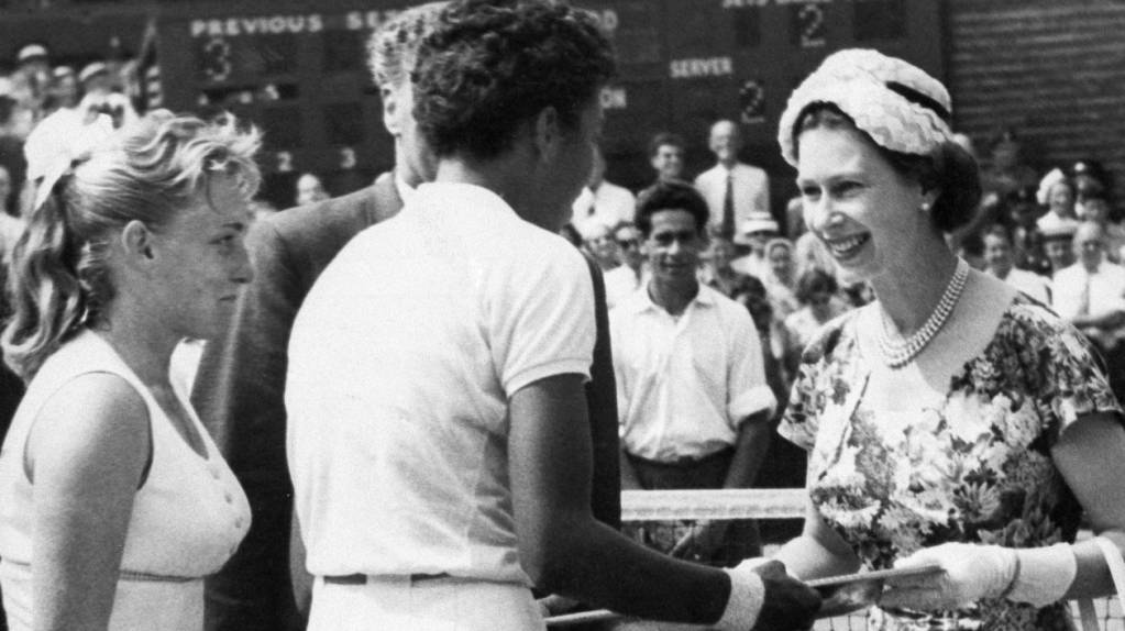 Queen Elizabeth II presenting Althea Gibson with the Venus Rosewater Trophy in 1957