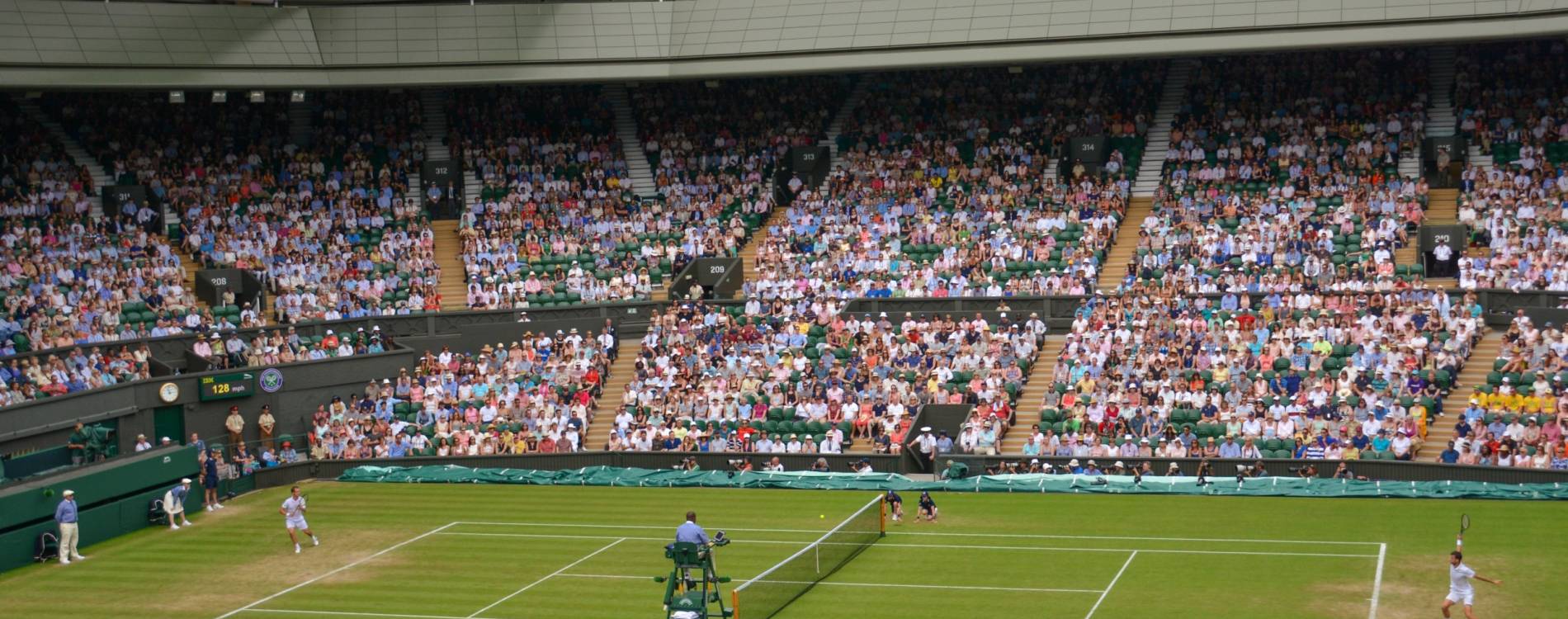 Richard Gasquet and Grigor Dimitrov competing at The Championships, Wimbledon