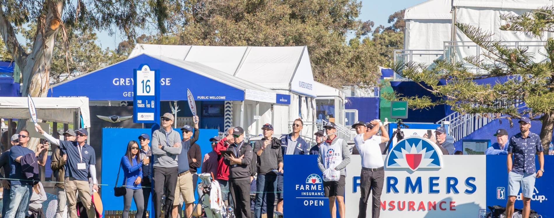 Rickie Fowler tees off at the Farmers Insurance Open