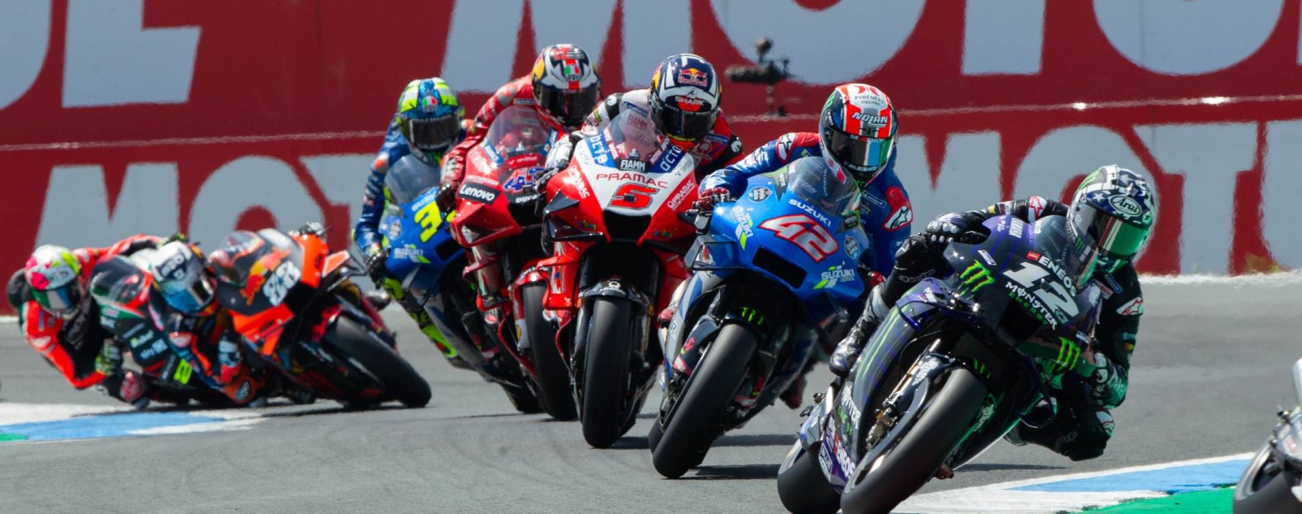 Riders take a corner in the MotoGP of the Netherlands