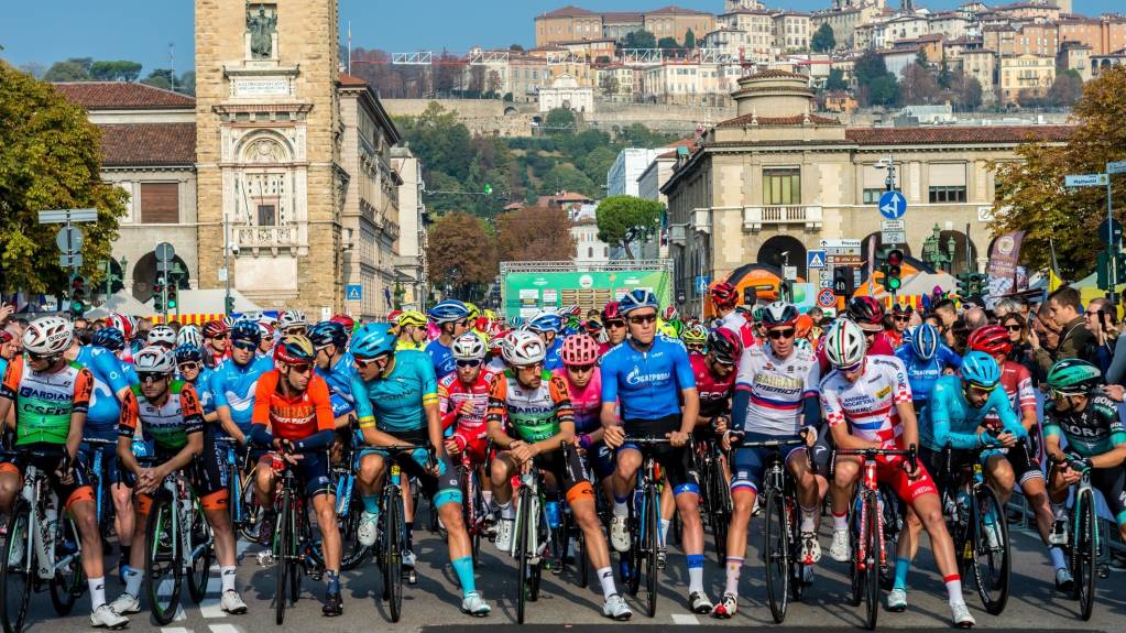 Riders wait at the start line of Il Lombardia